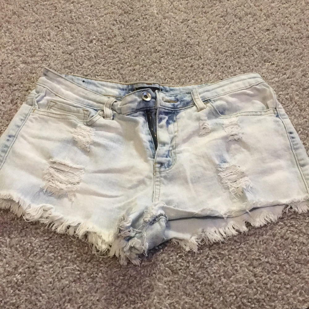 Light wash distressed jean shorts